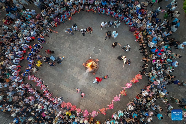 Centuries-old Yizu Dage art becomes major tourist attraction in SW China