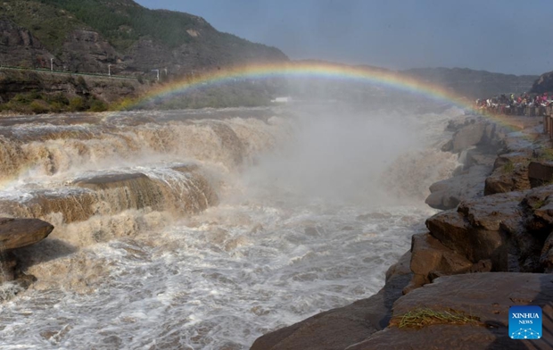 Scenery of rainbow over Hukou Waterfall in China